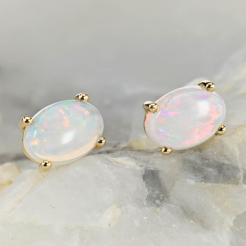  *   A BRILLIANT FIRE 18KT GOLD PLATED AUSTRALIAN WHITE OPAL STUD EARRINGS