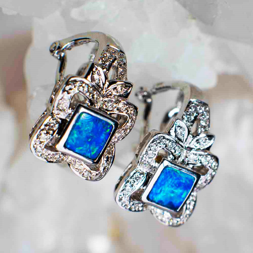 * A FLOWER GLAMOUR 14KT WHITE GOLD & DIAMOND AUSTRALIAN OPAL EARRINGS