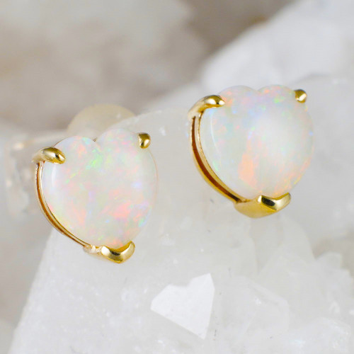 * A GOLD HEART 14KT YELLOW GOLD STUD EARRINGS