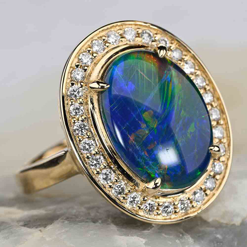   *   MANGO BELLINI 14KT YELLOW GOLD & DIAMOND AUSTRALIAN OPAL RING