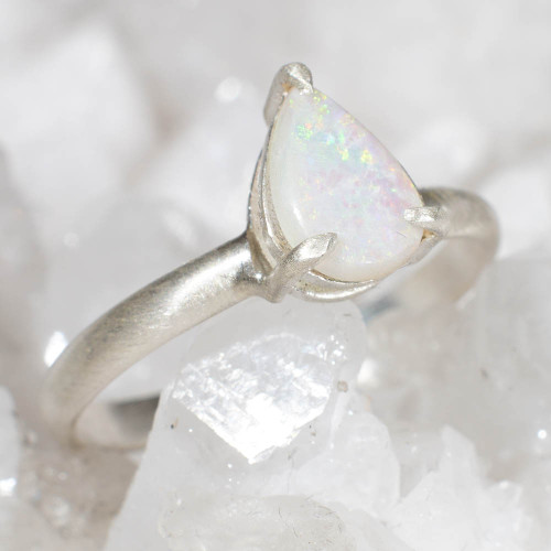 *A BRIGHT VORTEX STERLING SILVER AUSTRALIAN OPAL RING