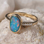   *    A  COLOR CASCADE 14KT YELLOW GOLD & DIAMOND AUSTRALIAN OPAL RING