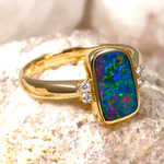   *    A  CELESTIAL SPARKLE 14KT YELLOW GOLD & DIAMOND AUSTRALIAN OPAL RING