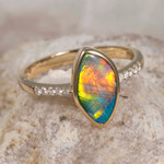   *    A  MYSTICAL VEIL 14KT YELLOW GOLD & DIAMOND AUSTRALIAN OPAL RING